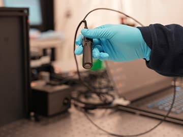 A Handheld, AI-Powered Microscope for Cancer Screening