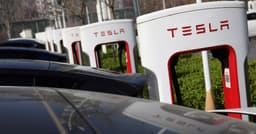 Tesla first-quarter deliveries likely to dip sequentially as EV demand softens | Reuters