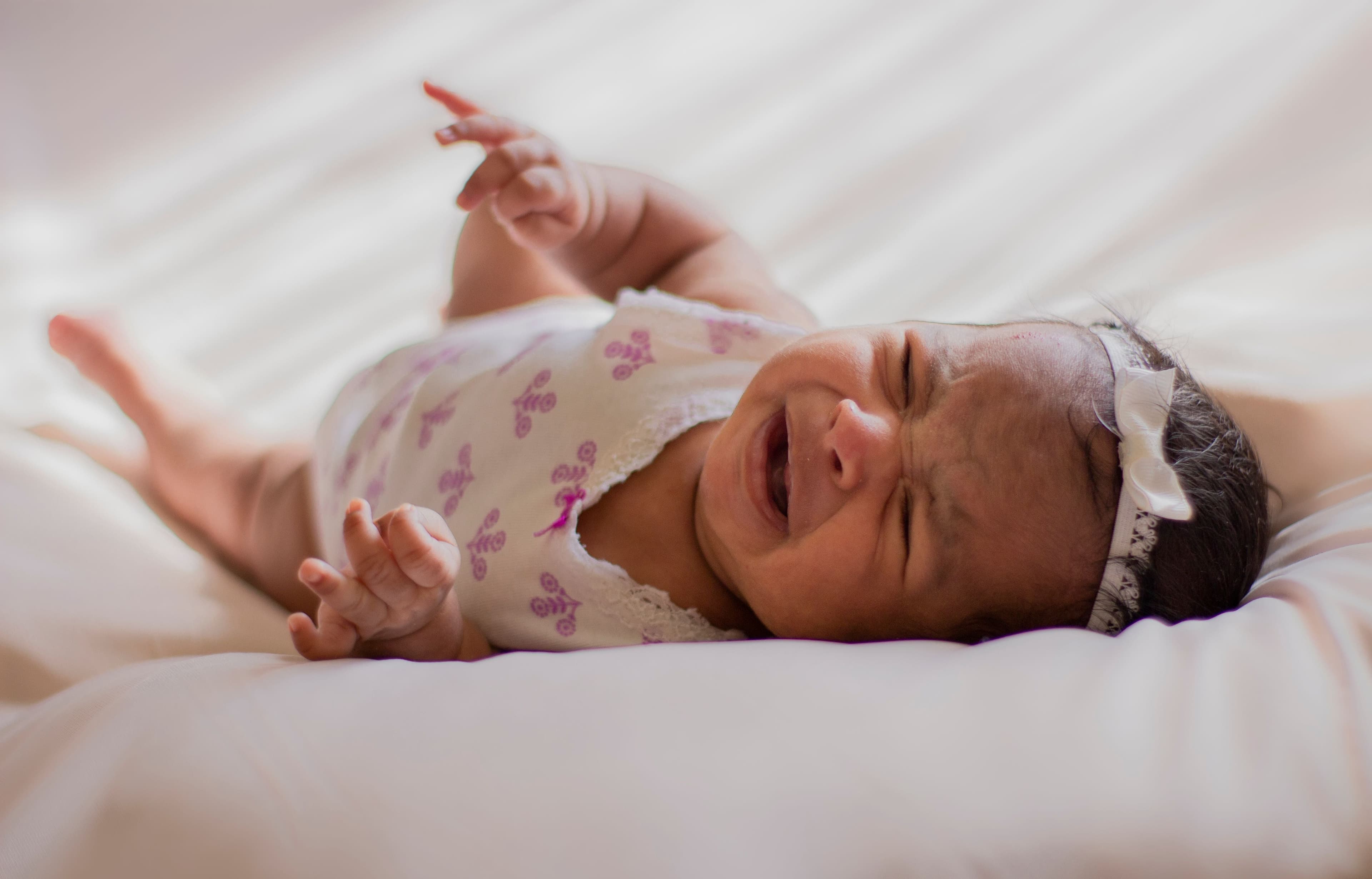 Why Does My Baby Cry When I Put Her Down? 7 Common ...