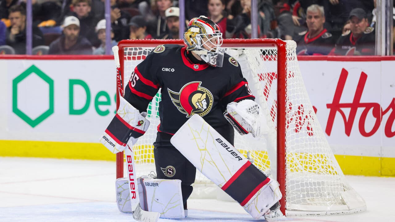Senators' Ullmark helped off ice after sustaining injury