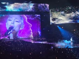Review: Ariana Grande puts on a dazzling arena concert in ...