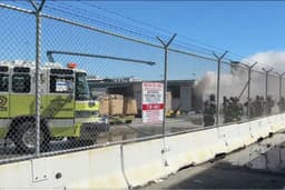 Smoke billows over San Francisco International Airport after cargo fire disrupts transit