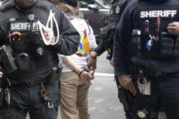 Protesters handcuffed at Philly Sheriff’s Office sit-in, demanding action on ICE courthouse arrests