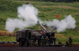 日本将加强国防建设视为实现经济繁荣之路