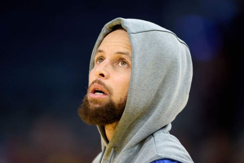 Stephen Curry’s Injury Scare vs. Kings Risks Play-In Chances as Star Plays Through Pain - Yahoo Sports