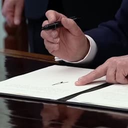 Trump signs order tightening mail-in voting rules | Reuters