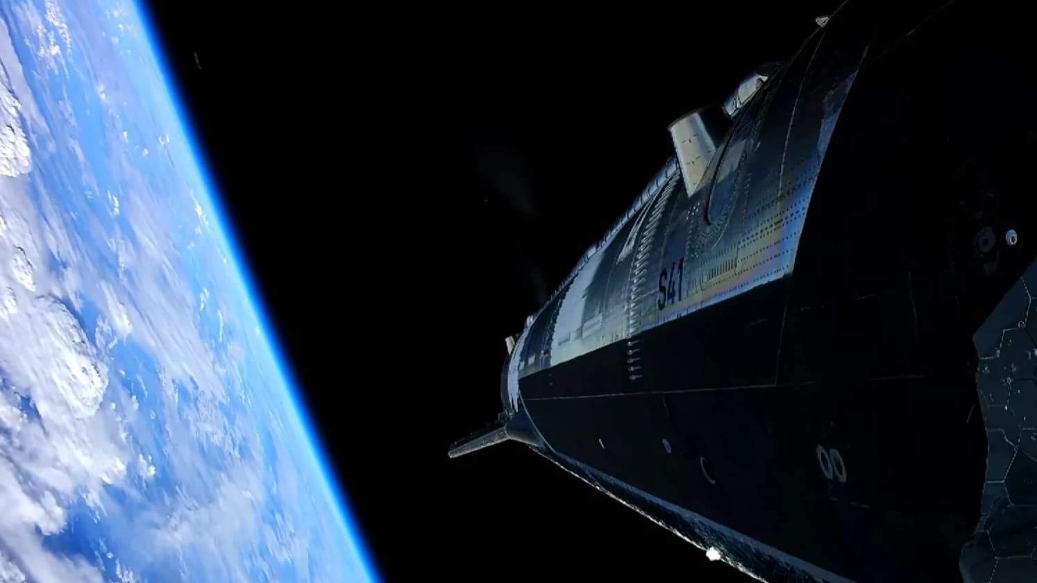 Starship reaches orbit and delivers 26 Starlink satellites