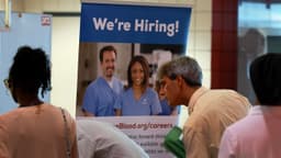 Hiring cools, wages trail inflation in mixed June jobs report
