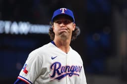 
	  Rangers’ deGrom said he felt something in right knee before Monday start but feels ‘OK’ - World Baseball Network  