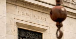 Stocks pull back after Fed raises rates, points to another hike this year