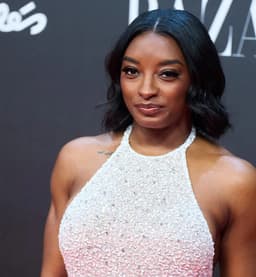 Simone Biles Dazzles in Daring Cutout Dress for Taylor ...