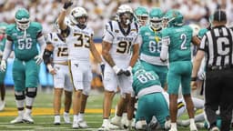 West Virginia football news: D-lineman carted off field with season ...