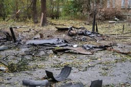 Russian drone strikes Kyiv, injures 6, sets car ablaze