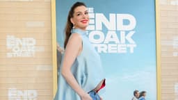 Anne Hathaway embraces ‘bump out’ maternity fashion