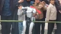 Robot dance show ends in DISASTER: Watch the horrifying moment a young boy is slapped across the face by a rogue humanoid as it performs a pirouette | Daily Mail Online