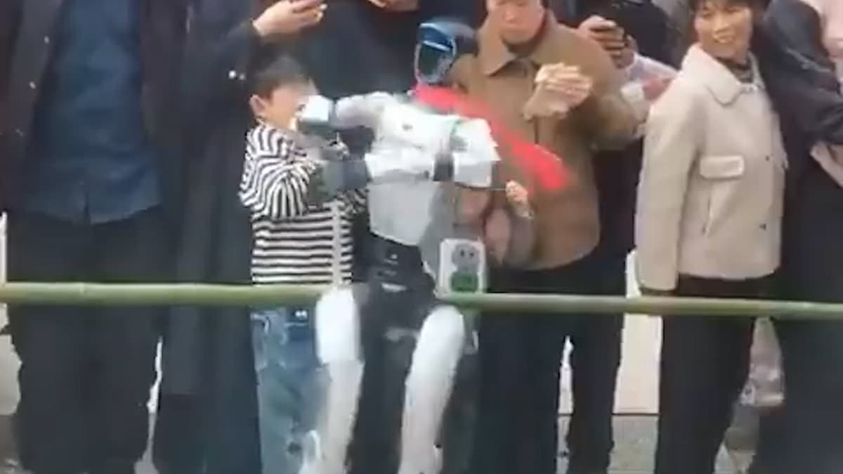 Robot dance show ends in DISASTER: Watch the horrifying moment a young boy is slapped across the face by a rogue humanoid as it performs a pirouette | Daily Mail Online