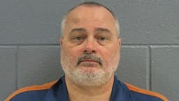 Father Charged with Sons' Murders